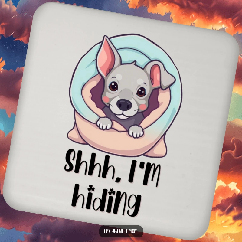 Funny Greyhound coaster, curious dog peeking from a blanket, cute drink accessory, humorous gift for home.