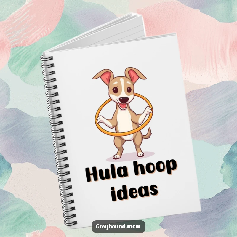 Funny Greyhound hilariously trying to spin a tiny hula hoop, featured on the cover of a charming notebook.