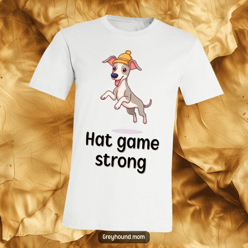 Funny Greyhound Hat T-Shirt: A dog in a tiny hat, leaping energetically, ideal funny gift for pet owners.